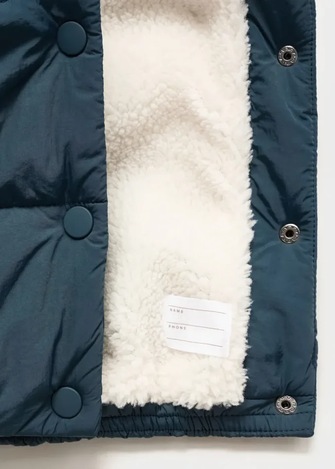 Anorak avec capuche effet peau lainée