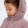 Anorak long rembourré avec capuche