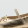 Ballerines métalliques avec nœud