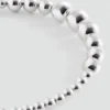 Bandeau à perles appliquées