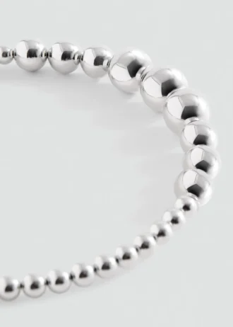 Bandeau à perles appliquées