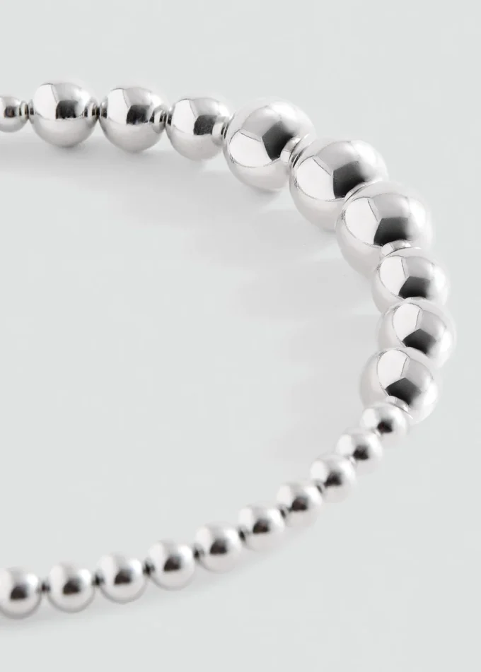 Bandeau à perles appliquées
