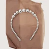 Bandeau à perles appliquées