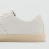 Baskets à empiècements en cuir