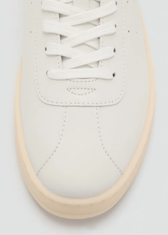 Baskets à empiècements en cuir
