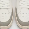 Baskets en cuir combinées