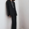 Blazer de costume avec poches à rabat
