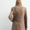 Blazer de costume en laine mélangée avec poches