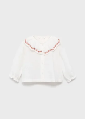 Blouse brodée en plumetis