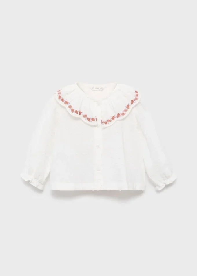 Blouse brodée en plumetis