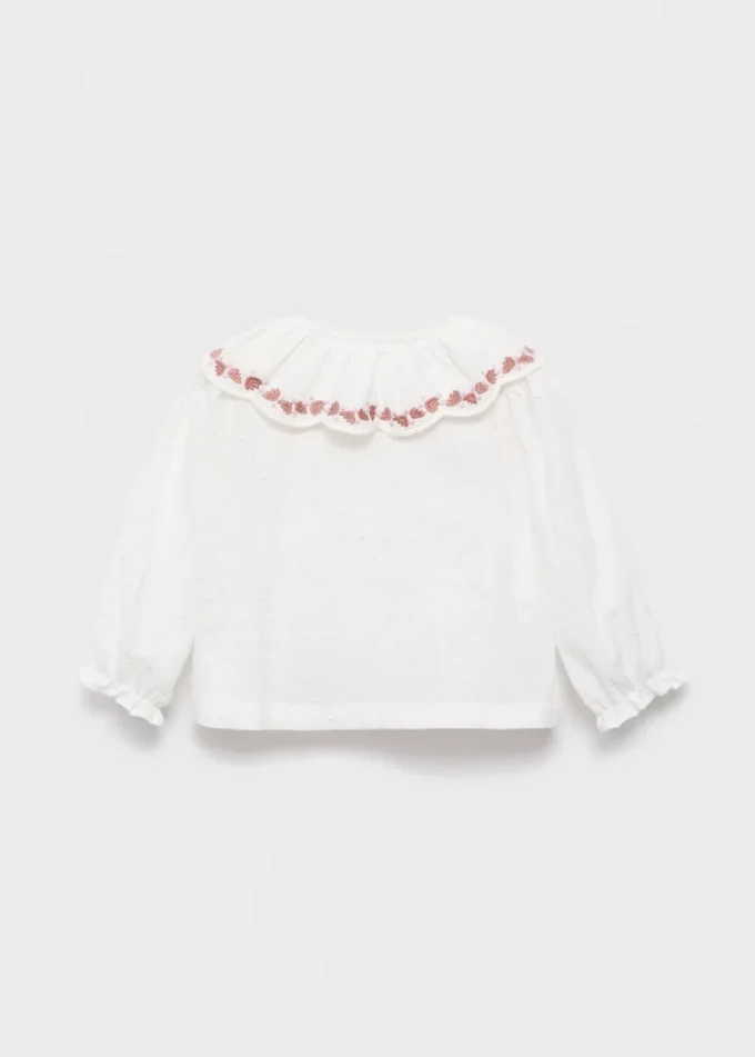 Blouse brodée en plumetis