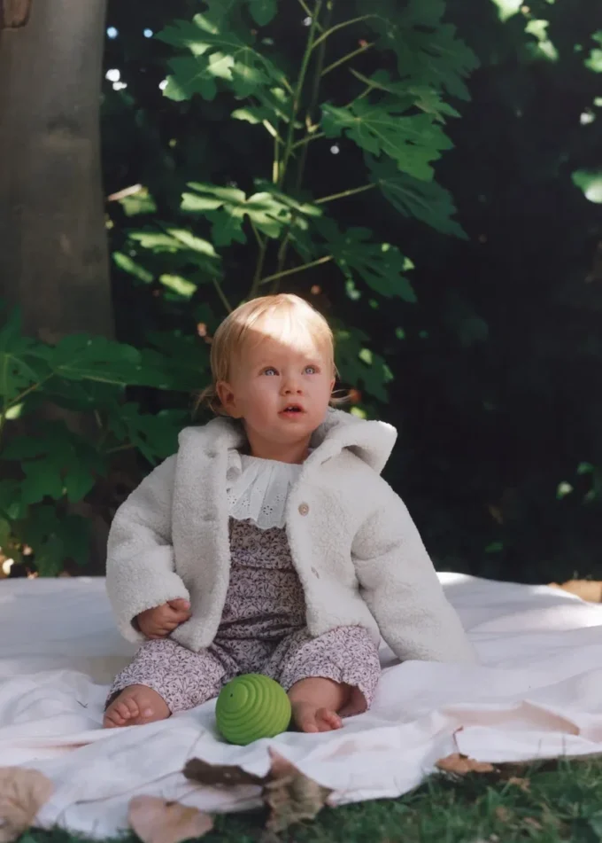 Manteau à capuche effet peau de mouton