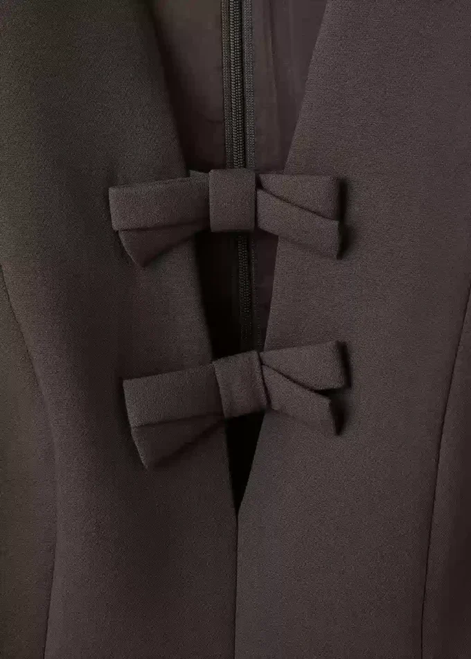 Blouse à col en V et nœuds