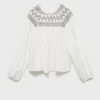 Blouse à détails brodés