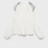 Blouse à détails brodés
