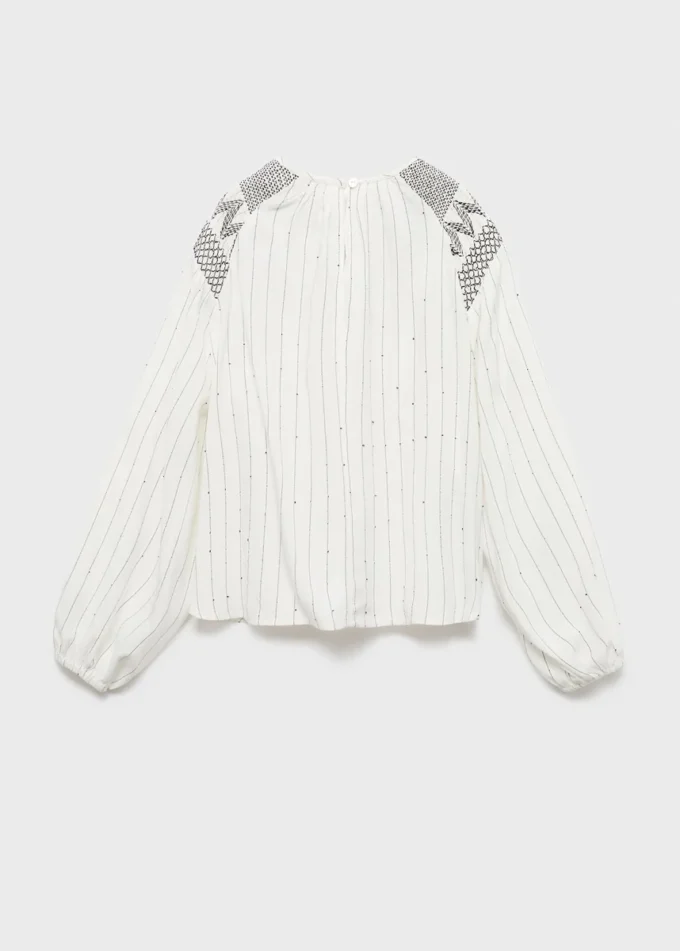 Blouse à détails brodés