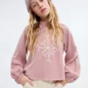 Blouse en coton avec broderies florales Blouse en coton avec broderies florales