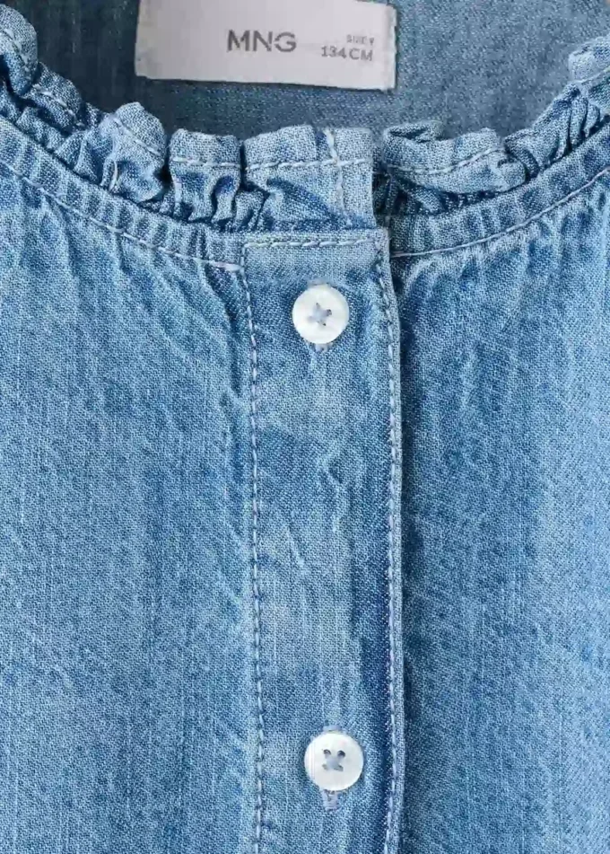 Blouse en denim brodée