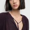 Blouse en mousseline avec encolure à nœud