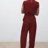 Blouse à encolure drapée et ceinture
