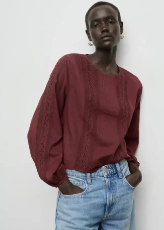 Blouse à manches bouffantes brodées