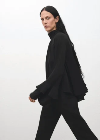 Blouse à manches évasées et volants