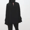 Blouse à manches évasées et volants