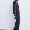 Blouse à pois avec col drapé