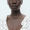 Blouse à pois avec volants