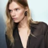 Blouse semi-transparente avec empiècements