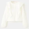 Blouse à volants en lurex