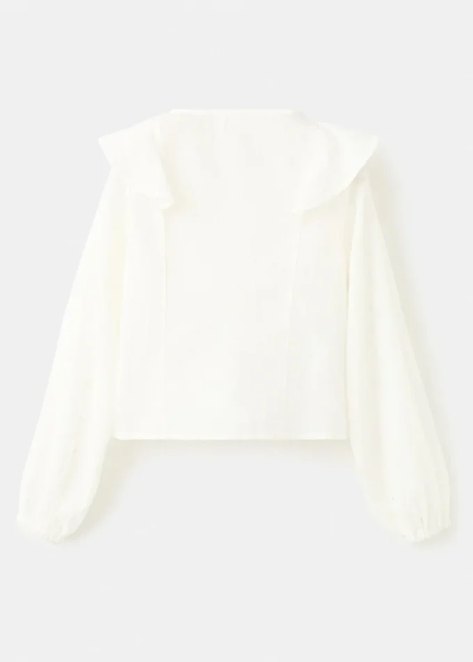 Blouse à volants en lurex