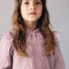 Blouse à volants et motif rayé