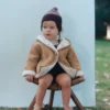 Manteau réversible double face en peluche
