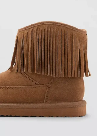Bottes en cuir à franges