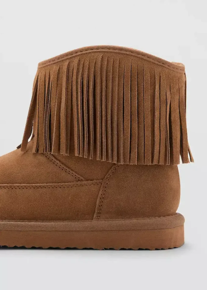 Bottes en cuir à franges