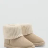 Bottines en cuir avec détail tricoté