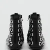 Bottines en simili cuir à œillets