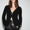 Cardigan en maille avec boutons bijoux