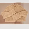 Cardigan en maille épaisse avec boutons bijoux