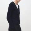 Cardigan tricoté tressé