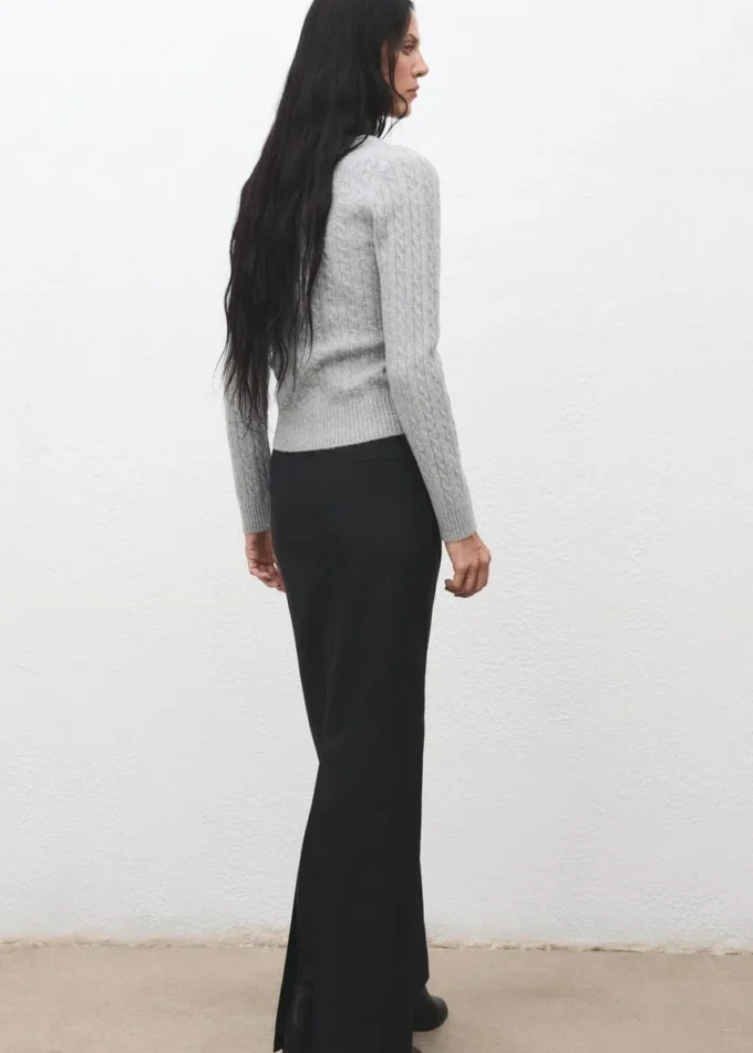 Cardigan tricoté tressé