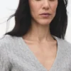 Cardigan tricoté tressé