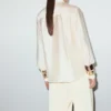 Chemise en satin avec strass