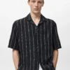 Chemise à manches courtes rayée 100 % lin