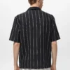 Chemise à manches courtes rayée 100 % lin