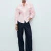 Chemise à plis et poches Chemise à plis et poches