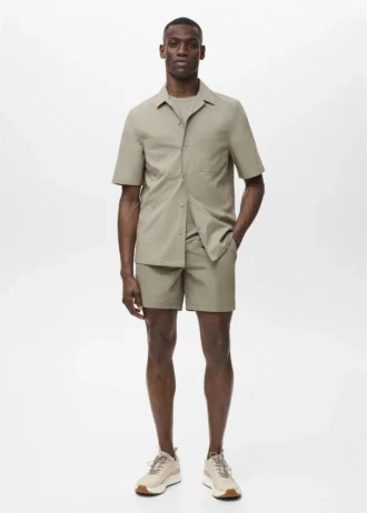 Chemise à poches et col bowling