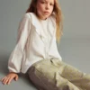 Chemise à volants froissés