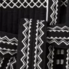 Gilet brodé avec ceinture